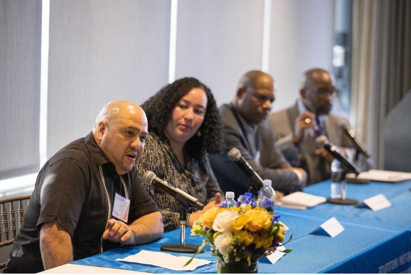 L to R: LLOP panel moderator Karl Bell, director of mentoring and academic achievement at Boston College, with panelists Carlos Maynard, Tariana Little, and Joel Mora.